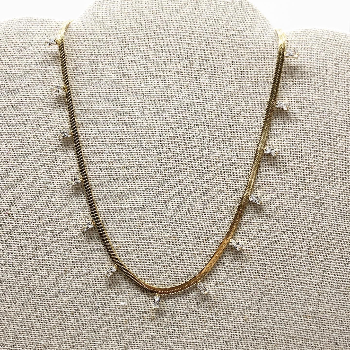 Cadena planchada + zirconias