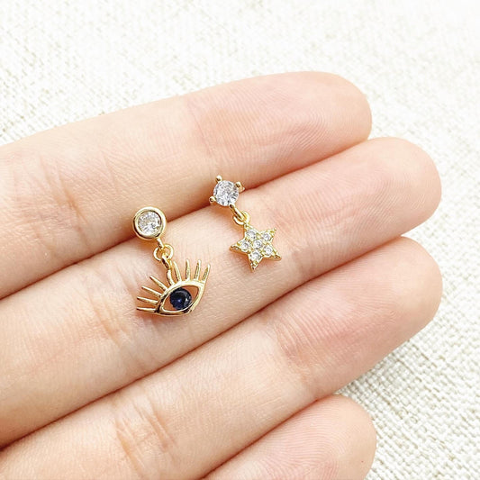 Aretes asimétricos ojo + estrella